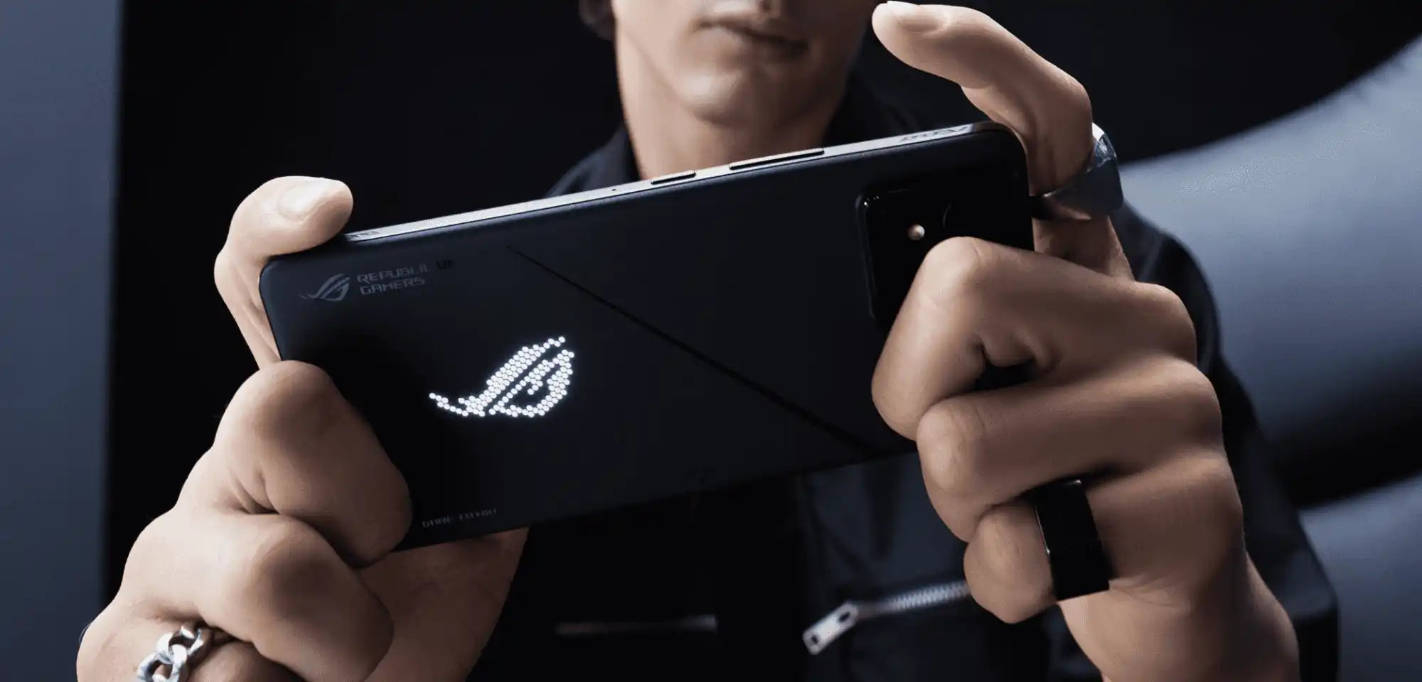 ROG (Republic of Gamers) gaming smartphone being held horizontally.